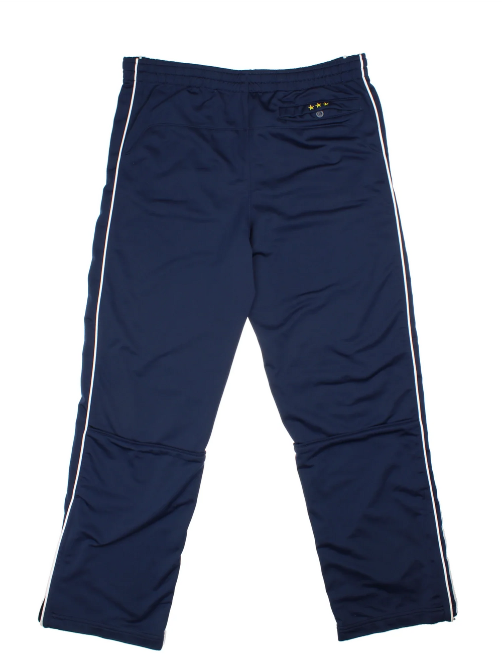 Nike Tracksuit Bottoms in a blue colourway with white stripes down the sides, pockets, elasticated waist with drawstring, and the logo embroidered on the front.