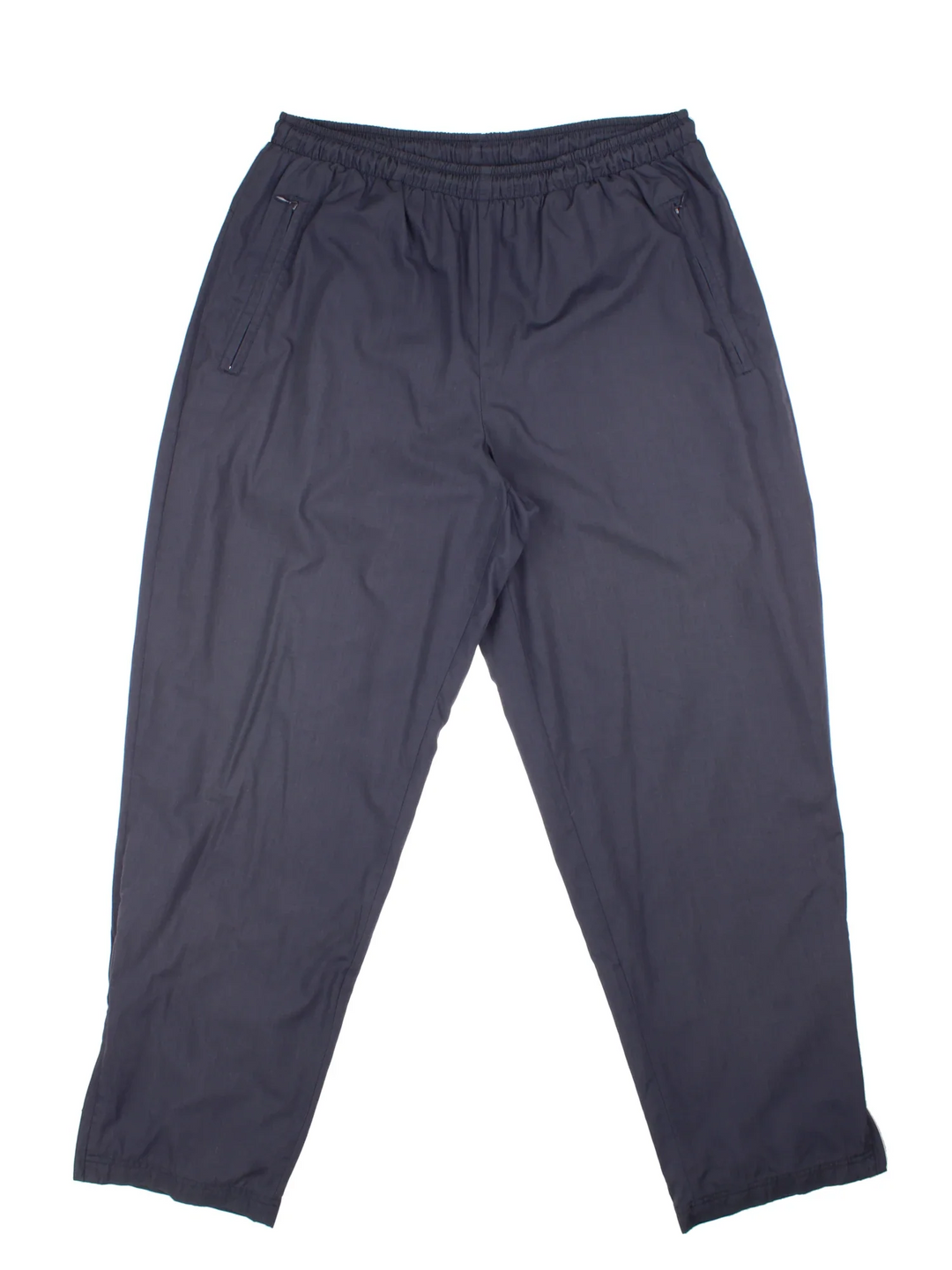 90's Nike Tracksuit Bottoms in a grey colourway with pockets, elasticated waist with drawstring, mesh lining, and has the swoosh logo embroidered on the back.