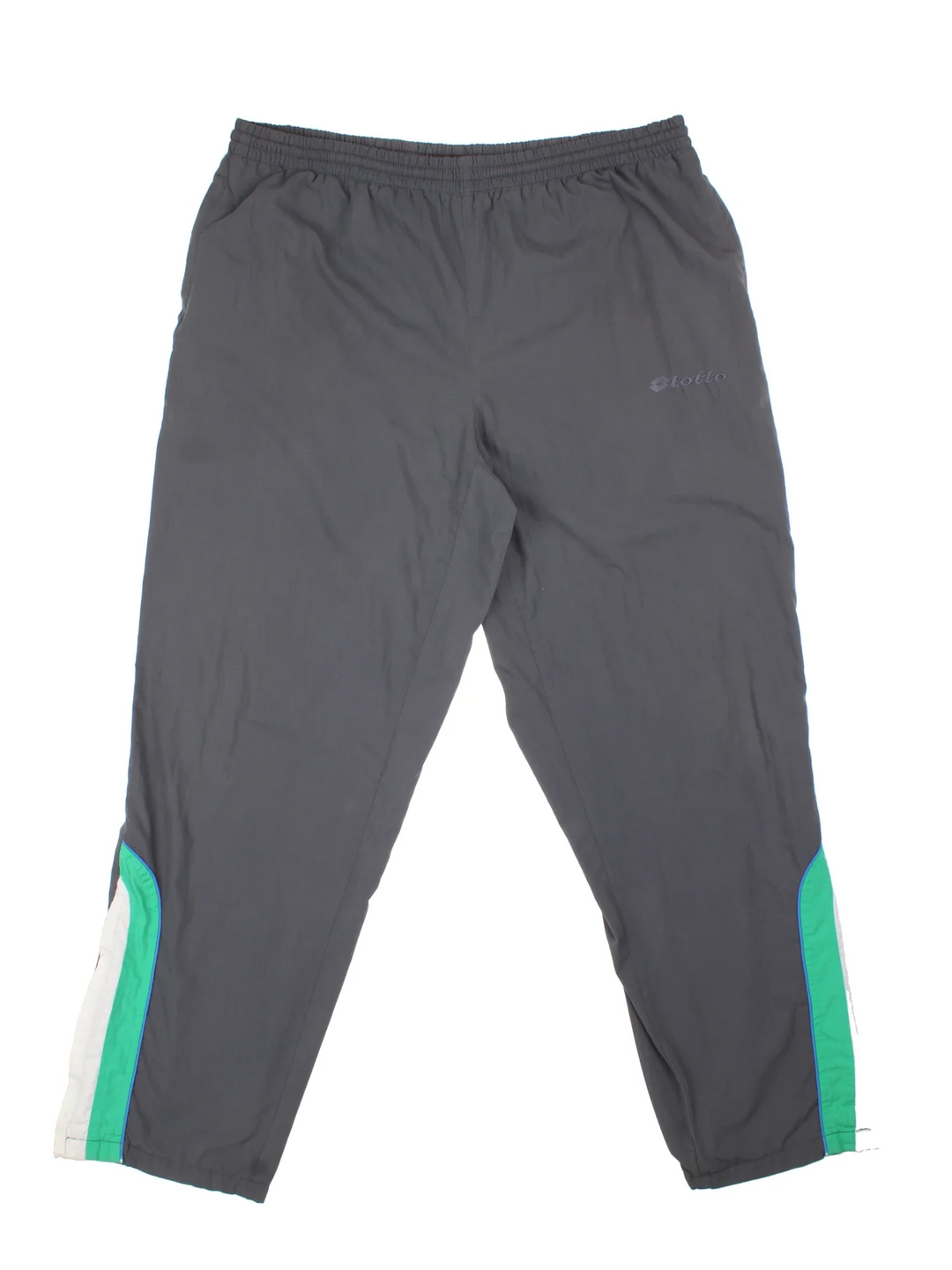 Vintage Lotto Shell Pants in a grey colourway with pockets, elasticated waist with drawstring, cotton blend lining, and the logo embroidered on the front.