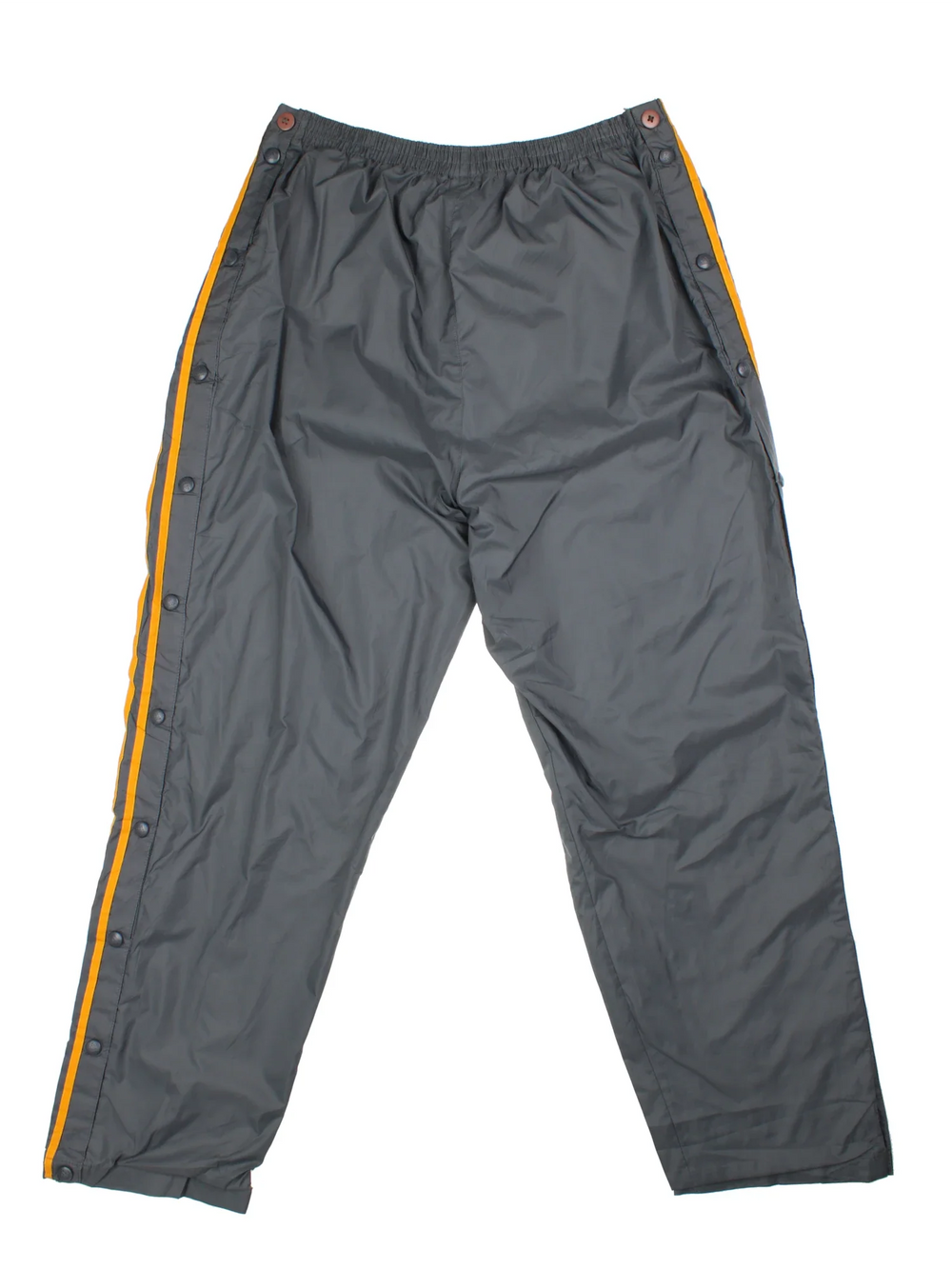 Vintage Adidas Popper Tracksuit Pants in a grey colourway with the iconic three stripes in orange down the sides, has pockets, elasticated waist, and the logo embroidered on the front.