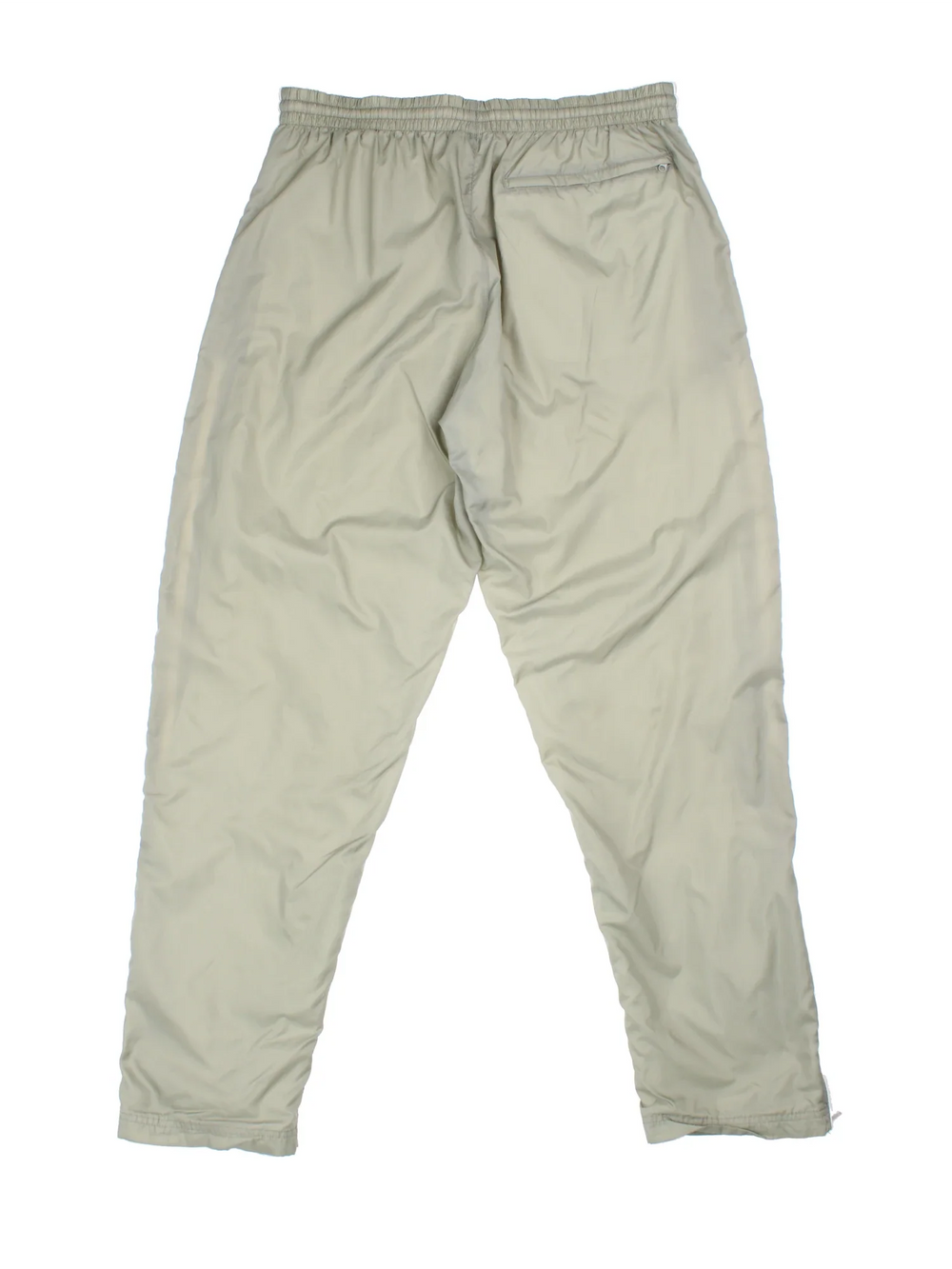 Nike Tracksuit Bottoms in green colourway, has pockets, elasticated waist with drawstring, and the swoosh logo embroidered on the front.