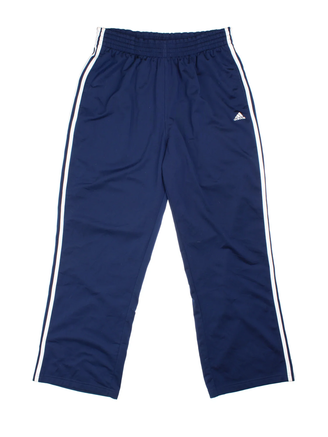Adidas Tracksuit Bottoms in blue colourway with iconic three stripes in white going down the legs, has pockets, elasticated waist with drawstring, and the logo embroidered on the front.