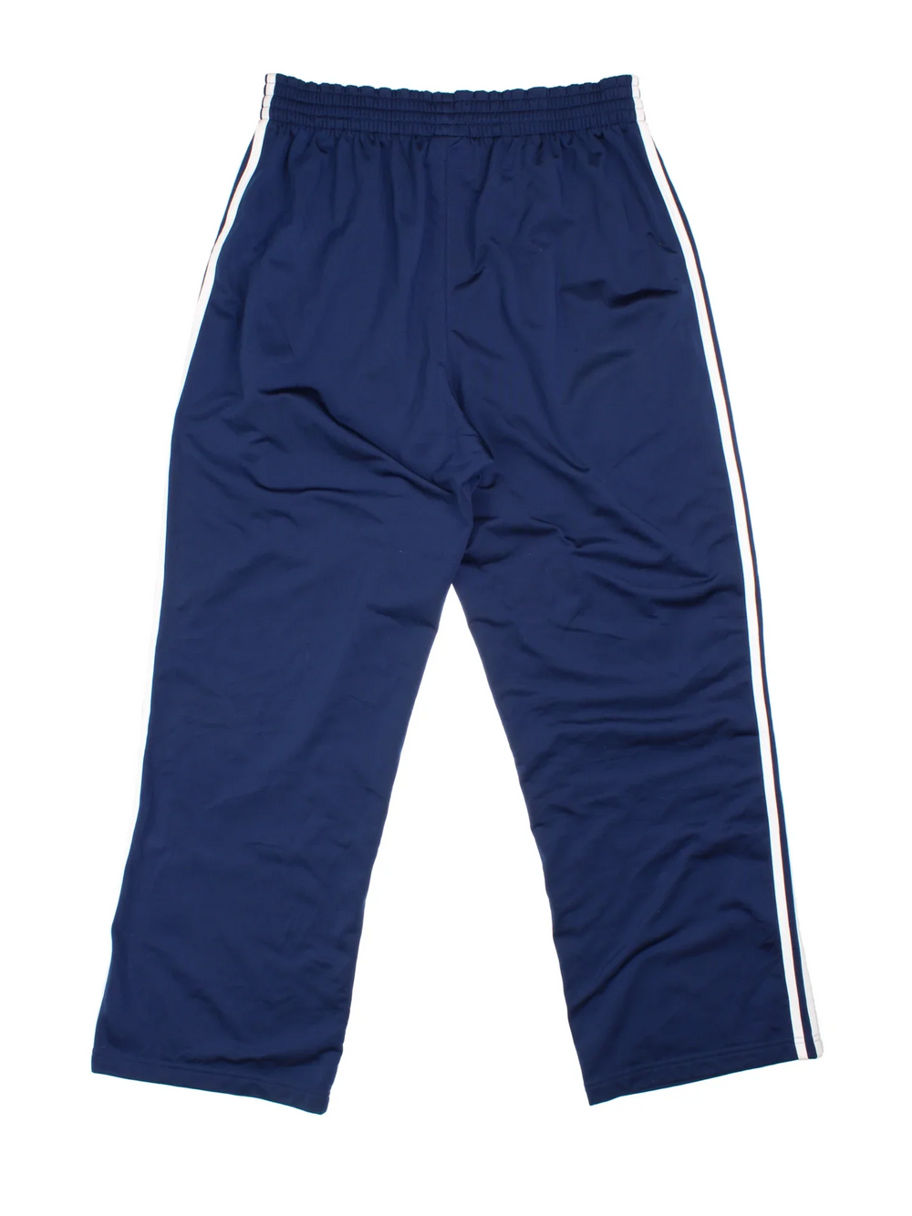 Adidas Tracksuit Bottoms in blue colourway with iconic three stripes in white going down the legs, has pockets, elasticated waist with drawstring, and the logo embroidered on the front.