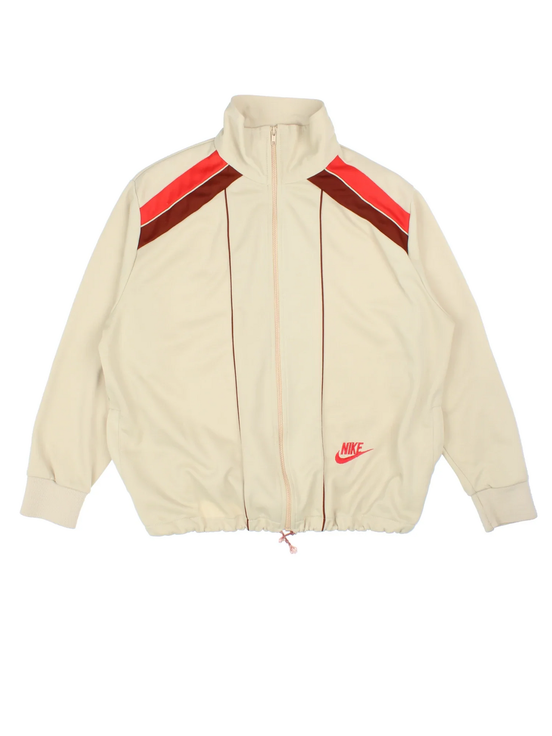 Nike Tracksuit Top in a tan colourway. Zip fastening with side pockets, contrast piping and branding embroidered on front.