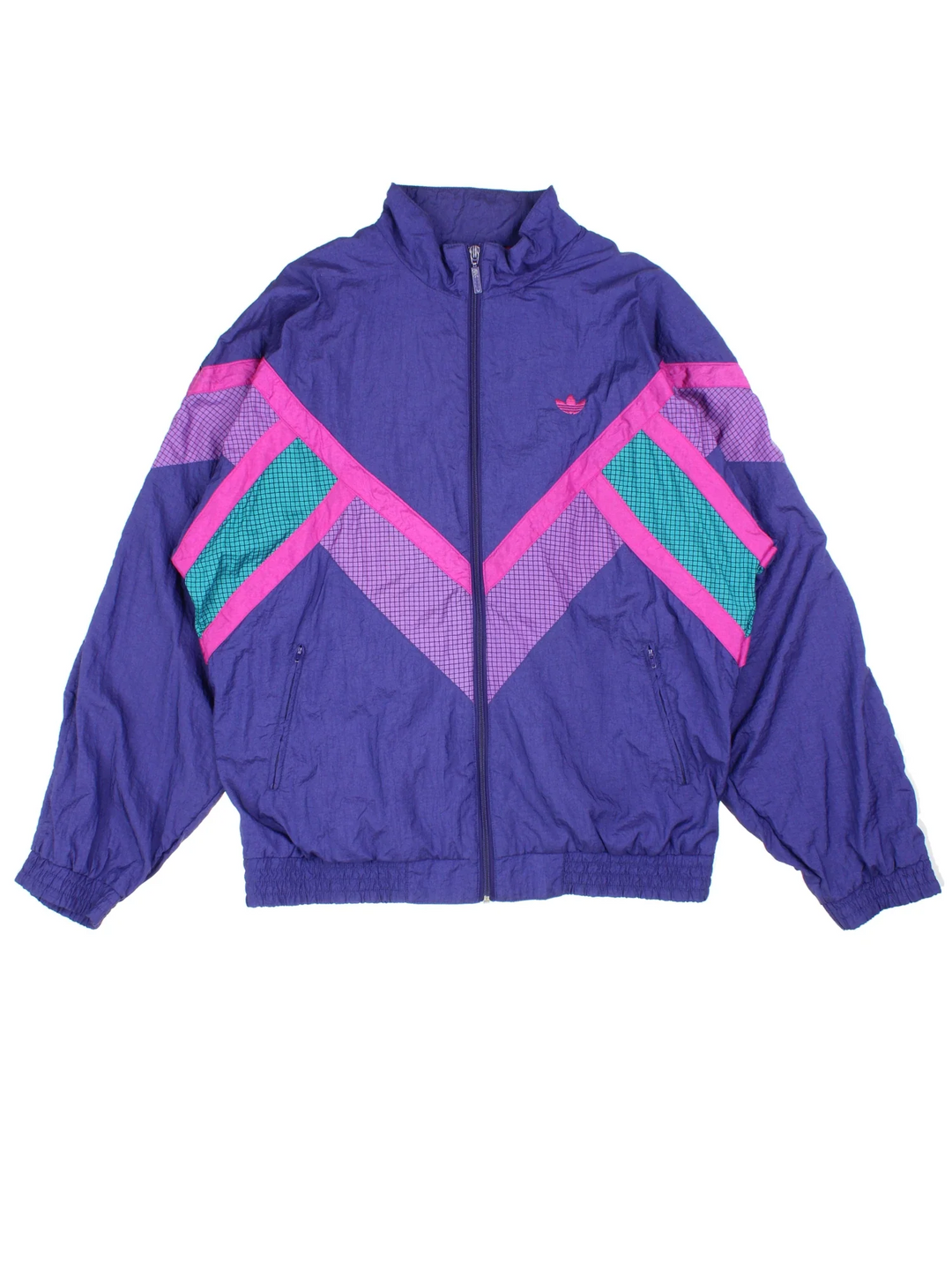 90's Adidas Shell Jacket in a purple/pink colourway. Zip up fastening, side pockets, jersey lining and has the logo embroidered on the front.