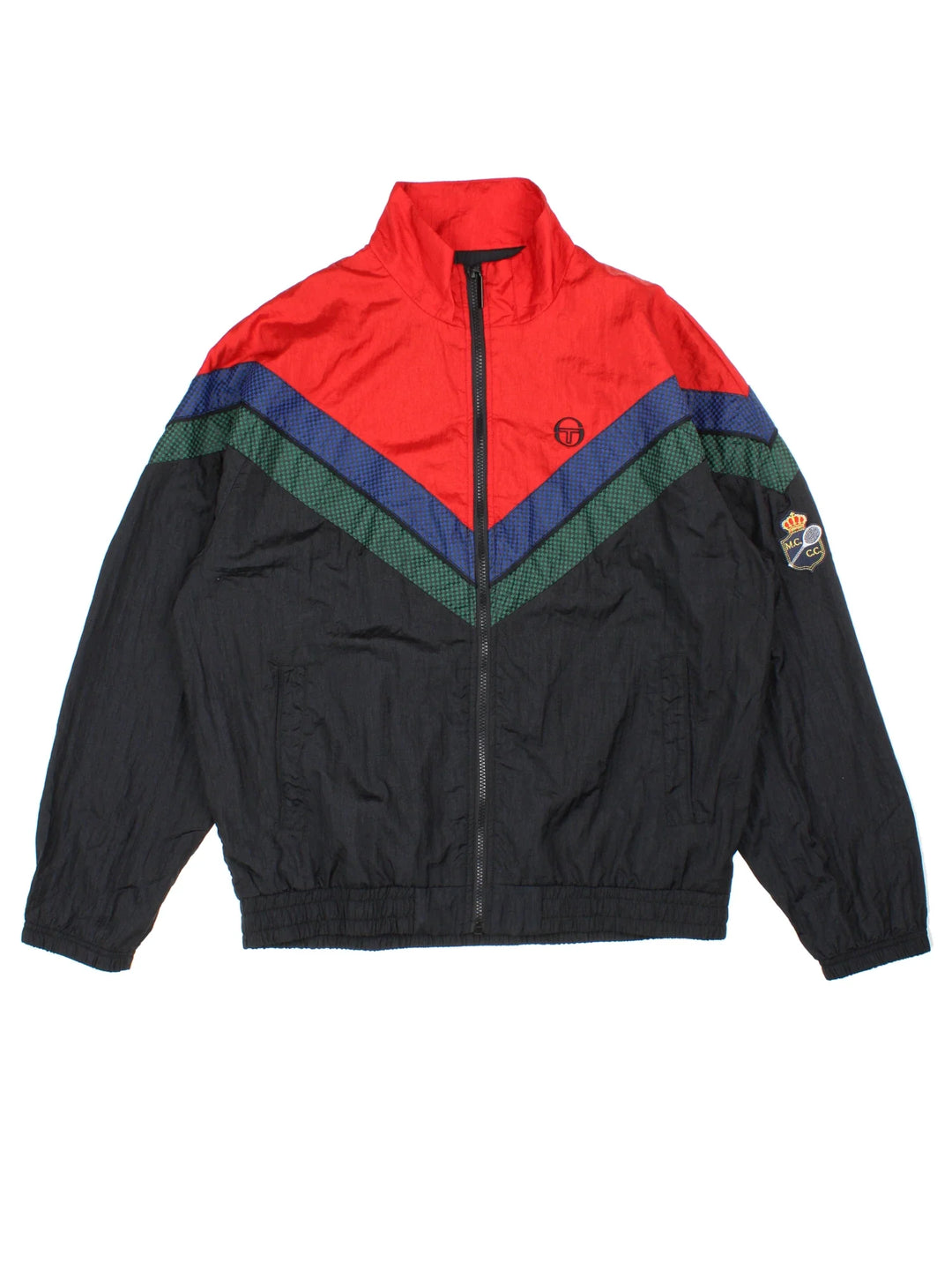 Sergio Tacchini Shell Jacket in a black/red colourway. Zip up fastening, side pockets, mesh lining and has the logo embroidered on the front/sleeve.