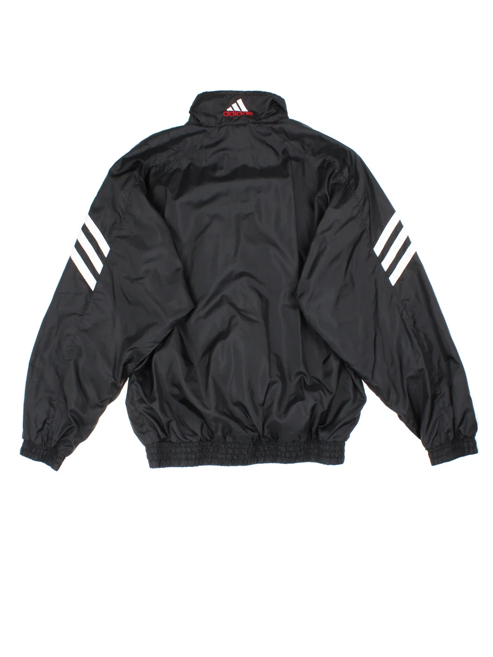 Vintage Adidas Tracksuit Top in a black colourway. Zip up fastening, side pockets, famous x3 stripe branding and has the logo embroidered on the front.