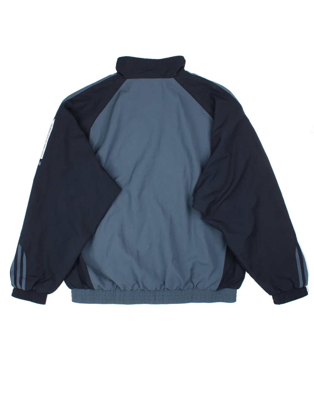Adidas Tracksuit Top in a grey/black colourway. Zip up fastening, side pockets, mesh lining and has the logo embroidered on the front.