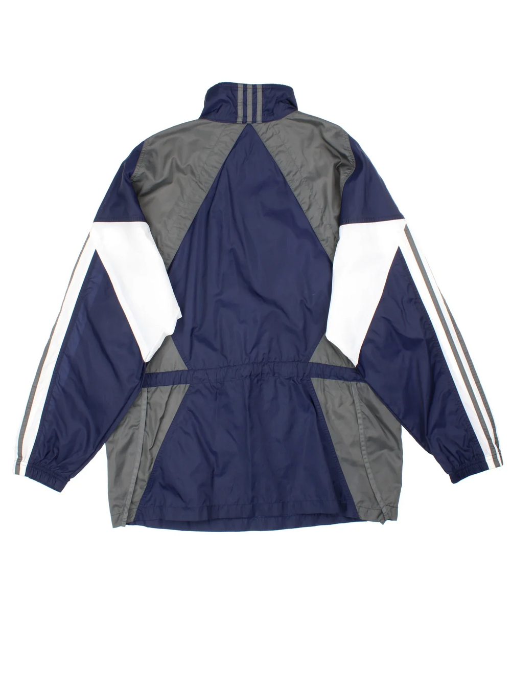 Vintage Adidas Windbreaker in a blue colourway. Half zip up closure and has side pockets with the logo embroidered on the front.