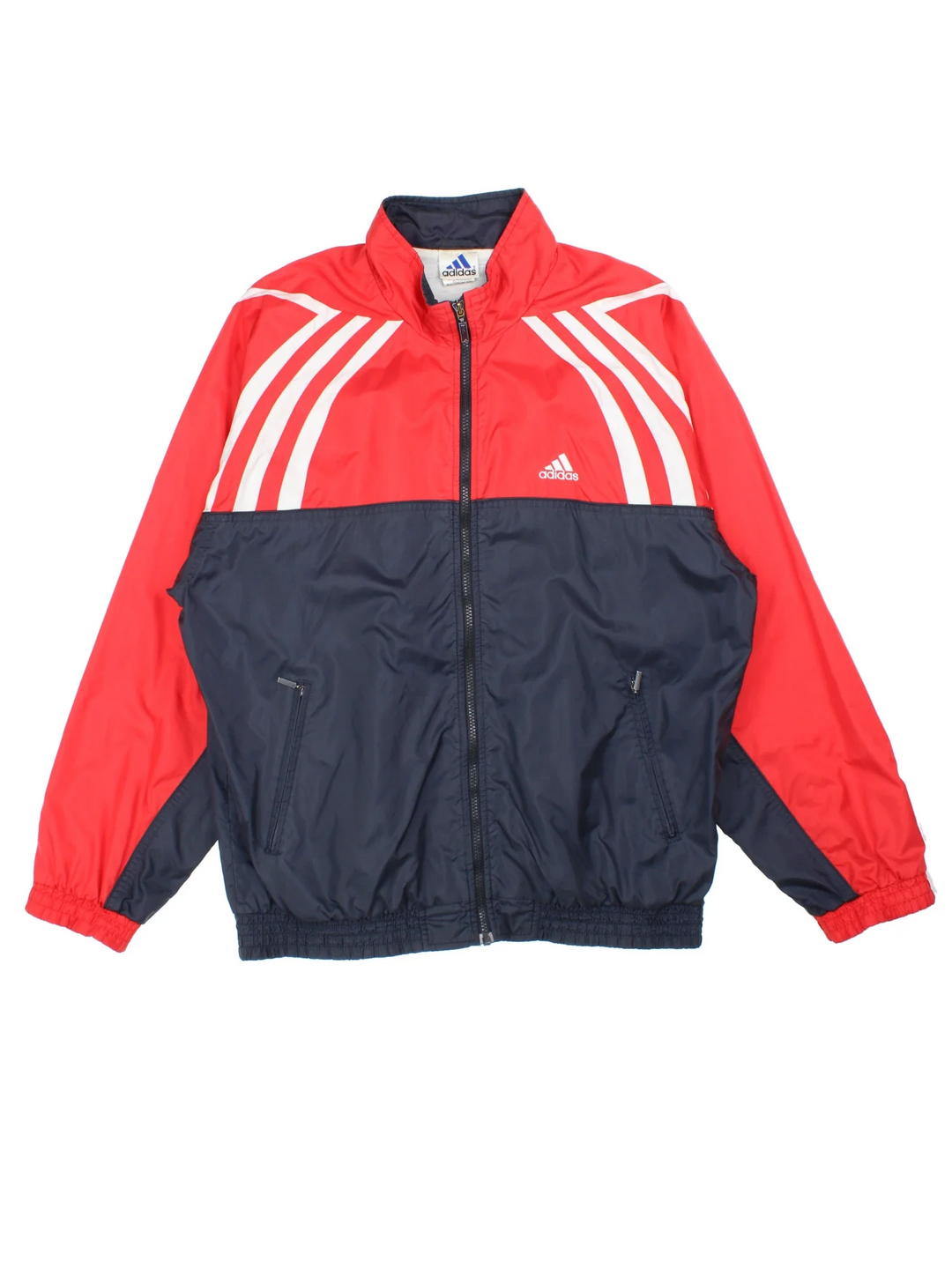 Vintage Adidas Tracksuit Jacket in a blue and red colourway. Zip up closure and has side pockets, and the logo embroidered on the front and back.