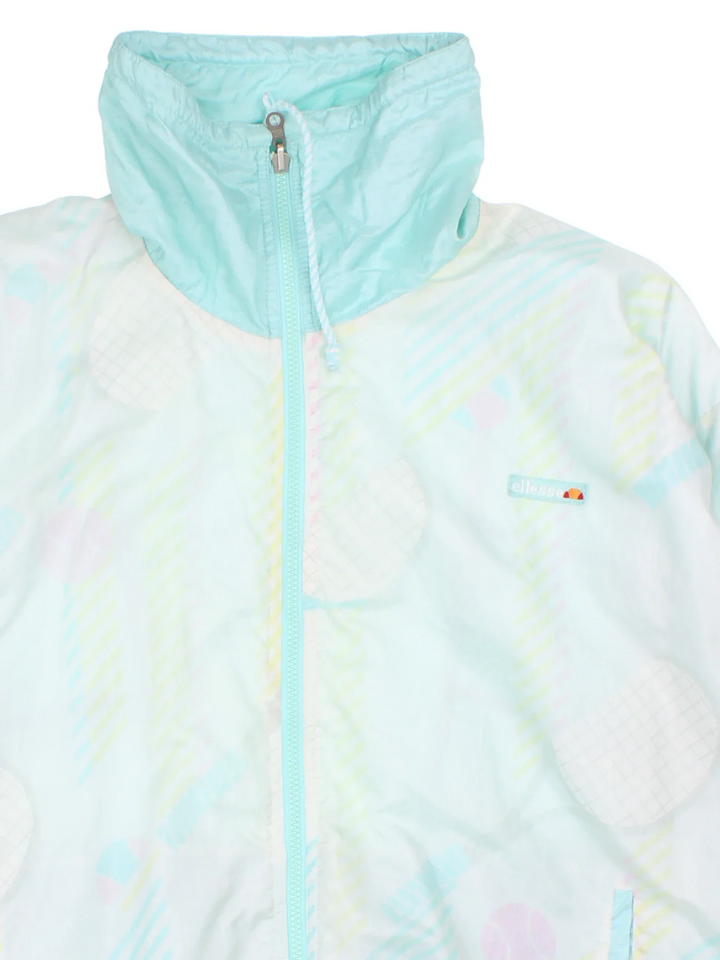 Vintage Ellesse Reversible Shell Jacket in either a blue or white patterned colourway. Zip up closure and has side pockets, and the logo embroidered on the front.