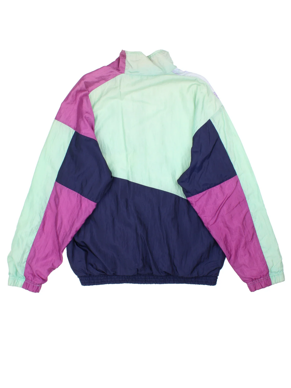 Vintage Sergio Tacchini Shell Jacket in a blue  and purple colourway. Zip up closure and has side pockets, and the logo embroidered on the front.