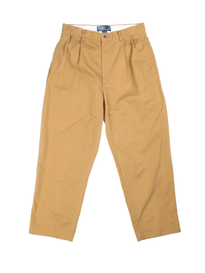 Ralph Lauren Pleated Trousers in tan colourway with multiple pockets and contrast branding on back. 