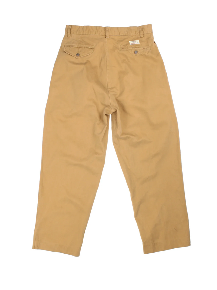 Ralph Lauren Pleated Trousers in tan colourway with multiple pockets and contrast branding on back. 