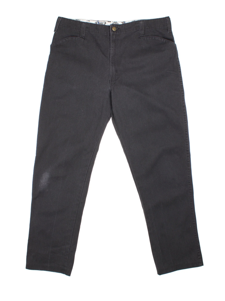 Ben Davis Work Trousers in a black colourway with pockets and the logo embroidered on the back.