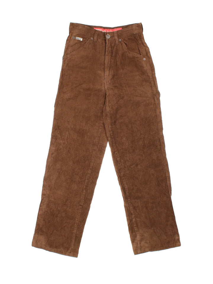Vintage Revolt Corduroy Trousers in brown colourway with multiple pockets, back buckle and the logo embroidered on the front/back.
