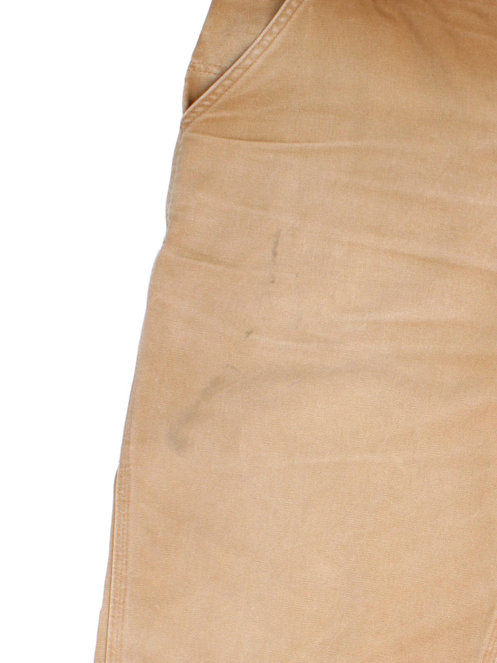 Carhartt Carpenter Jeans in a brown colourway with multiple pockets and leather logo on the back pocket.