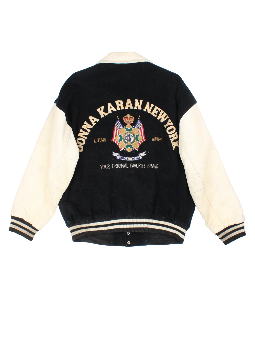 Vintage 90's DKNY black and white varsity jacket with wool body and leather sleeves, features embroidered badges and large spell-out motif on the back 