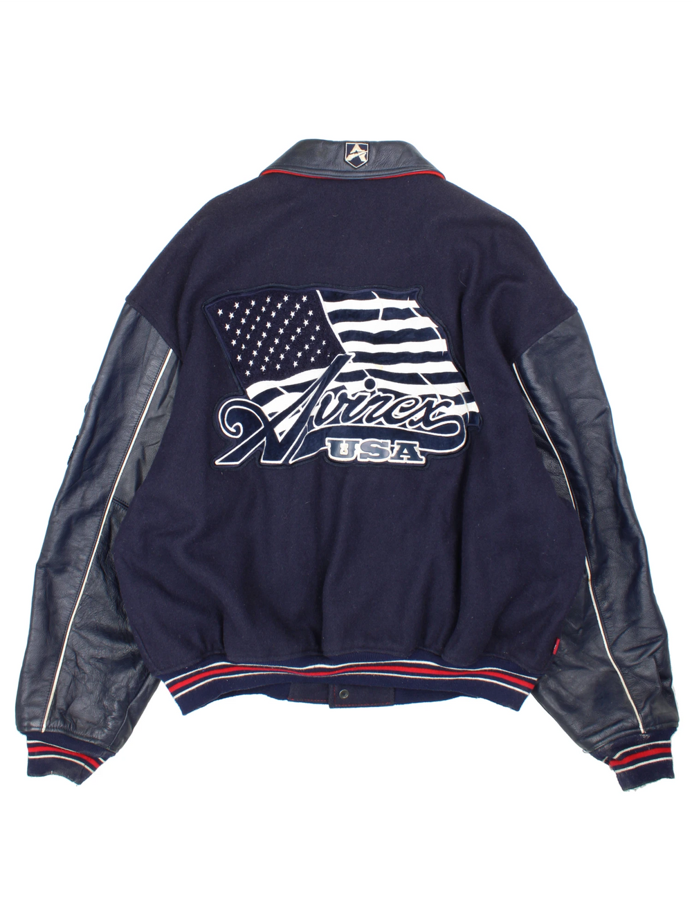 Vintage Avirex USA navy blue Varsity Jacket, embroidered badges on front, sleeve, and back. 