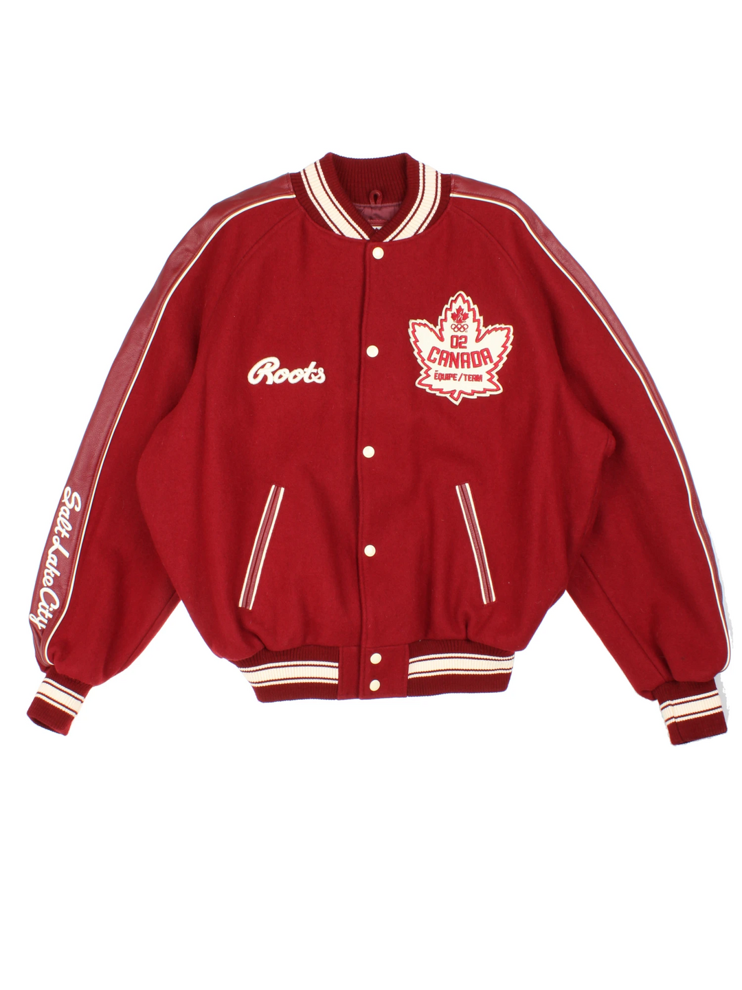 Vintage 2002 Winter Olympics team Canada varsity jacket, by Roots. Features embroidered badges and spell-out details