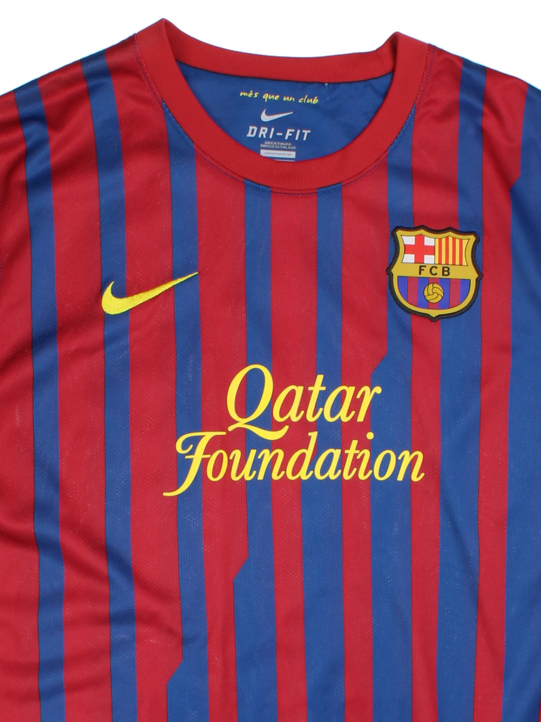 Vintage Barcelona 2011/12, Nike Home Football Shirt, blue, red and yellow colourway, and has logos printed throughout.
