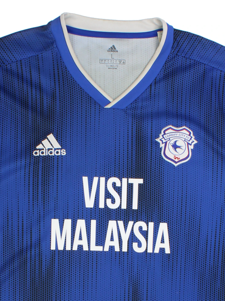Cardiff City England 2019/20 Adidas home football shirt. Features embroidered logo and badge on the chest.