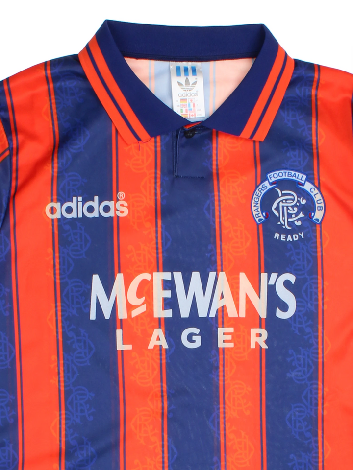 Vintage Rangers 1993/94, Adidas Football Kit in a blue and orange colourway, button up collar, and has logos printed on the front.