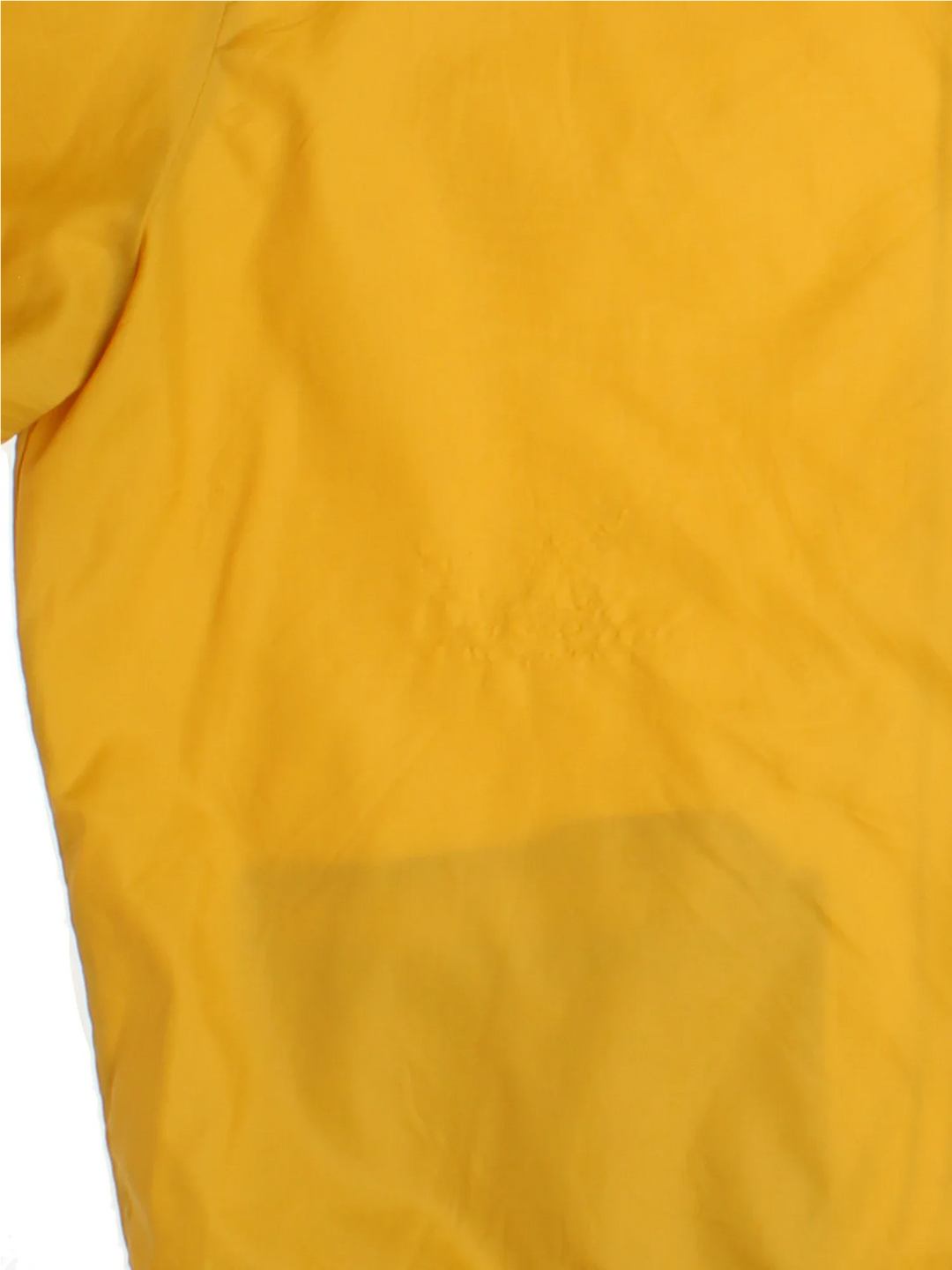 Vintage 1960's Champion Nylon Jacket in a yellow colourway. Zips up and has side pockets, hidden hood, and has the Delta logo printed on the front.