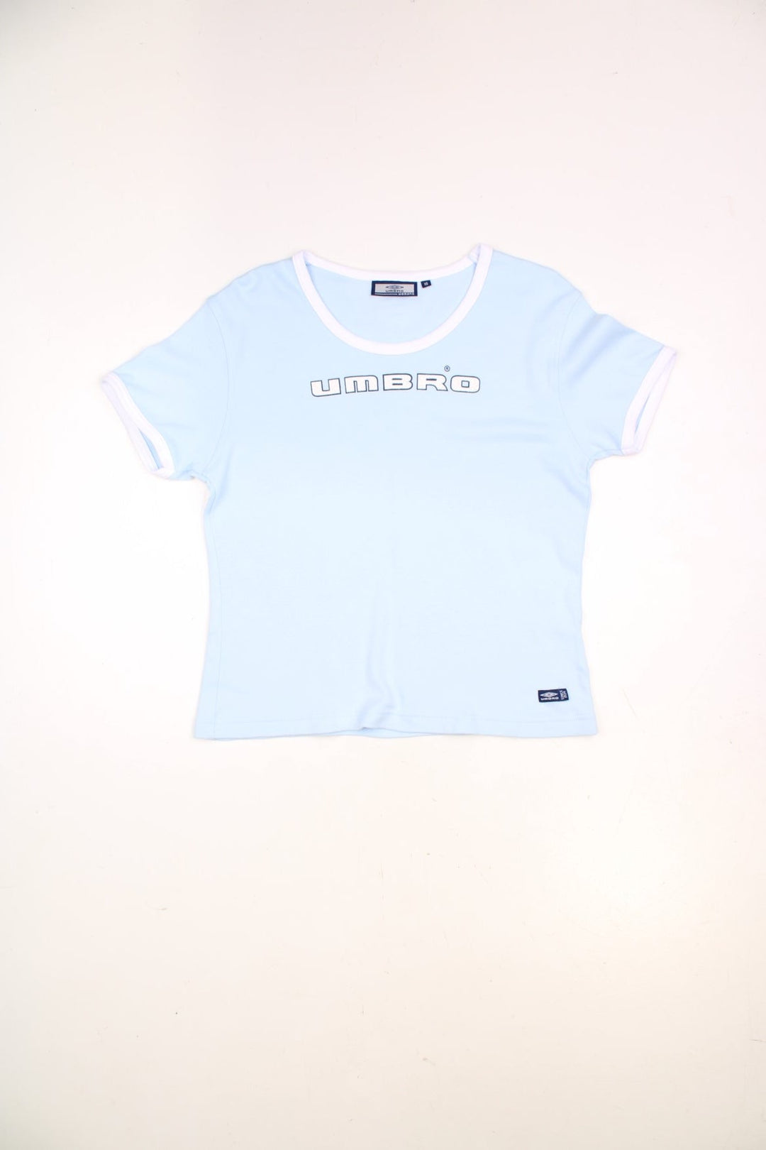 2000's Umbro baby tee in pale blue, features white piping and glittery spell-out detail across the chest