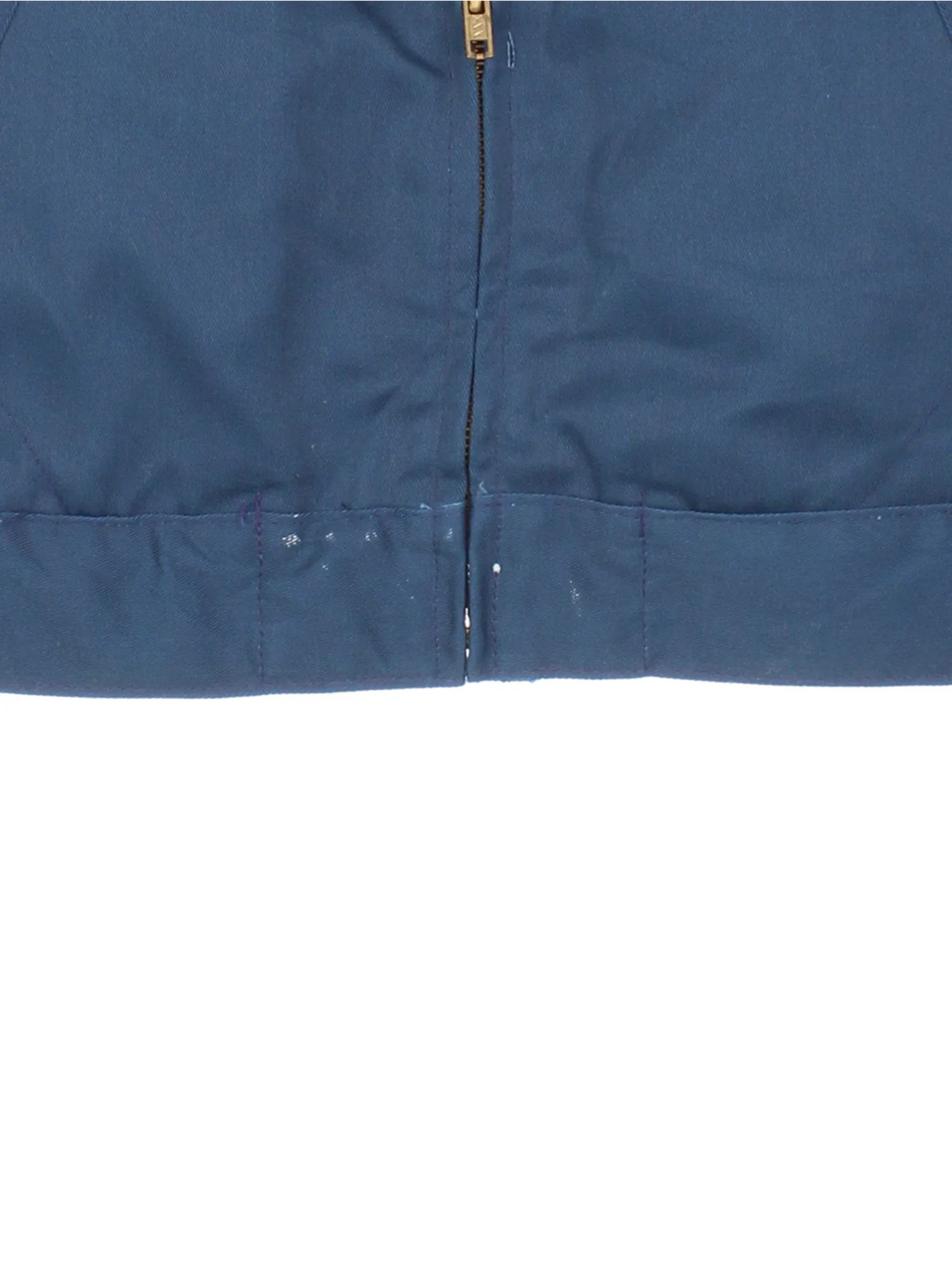 Dickies Sherpa Work Jacket in a blue colourway. Zip up closure and has multiple pockets, insulated with a sherpa lining.