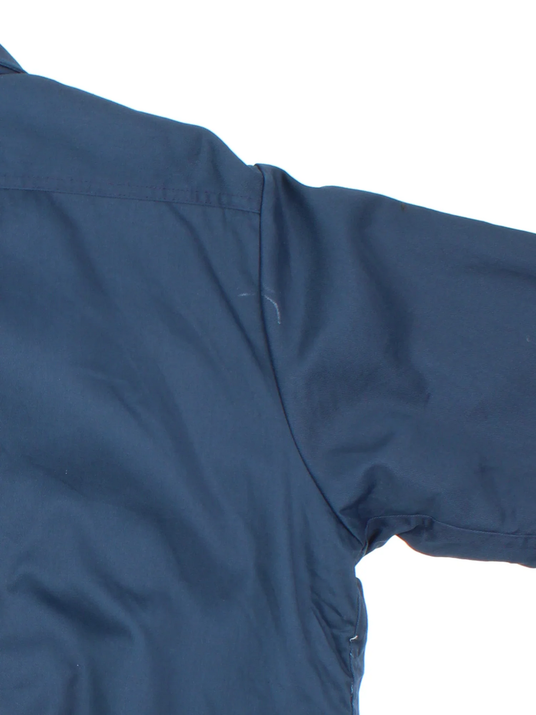 Dickies Sherpa Work Jacket in a blue colourway. Zip up closure and has multiple pockets, insulated with a sherpa lining.
