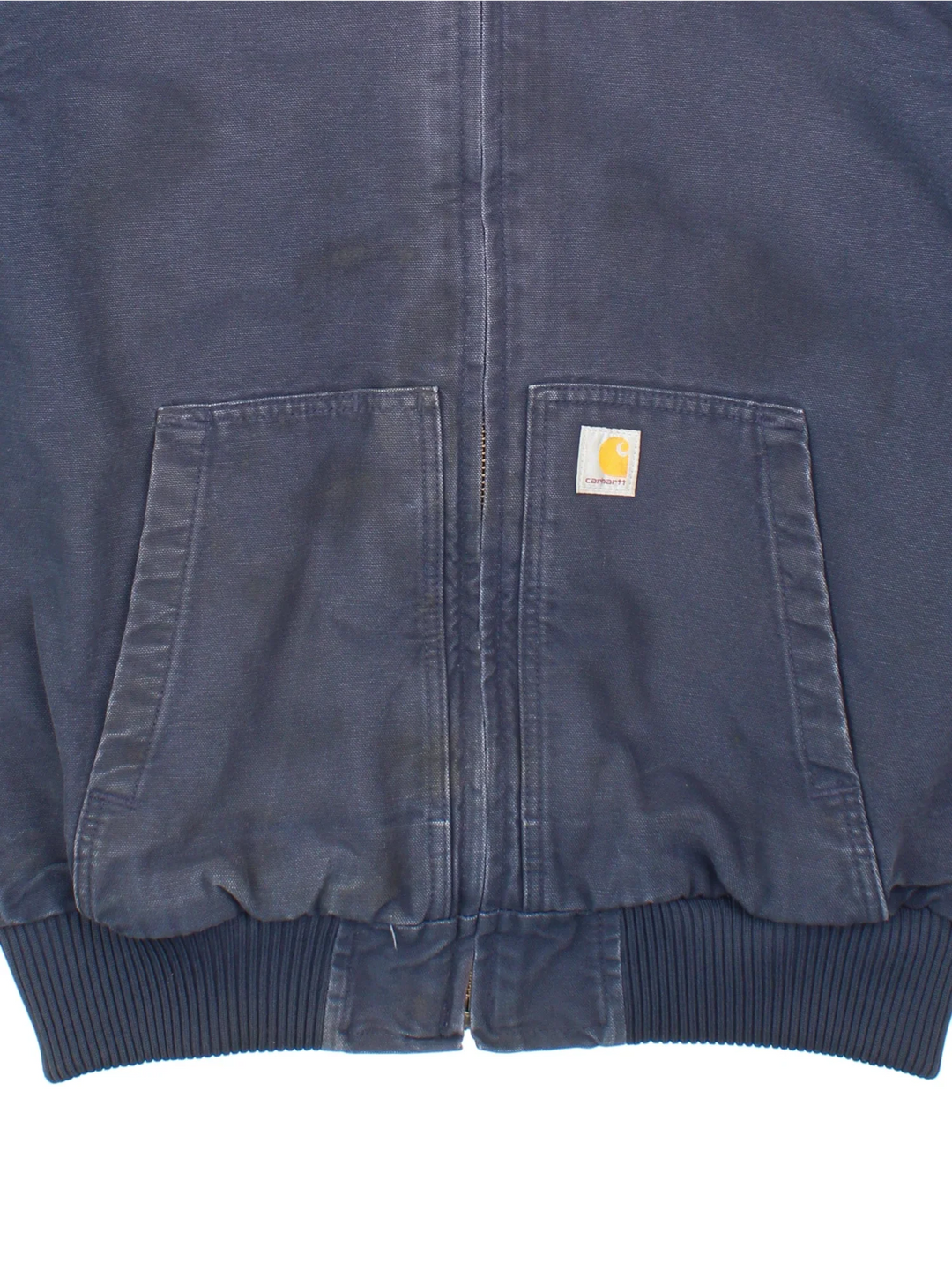 Carhartt Active Jacket in a blue colourway. Zip up closure and has side pockets, insulated with a quilted lining, hooded, and has the logo embroidered on the front.
