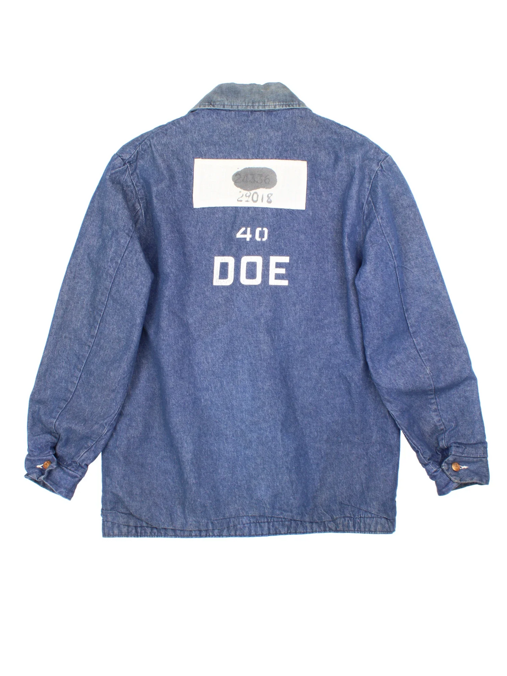 Vintage Blue Bell Wrangler Chore Work Jacket in a blue colourway. Buttons up and has multiple pockets, insulated with a blanket lining, corduroy collar, and has embroidered patch and printed spell out on the back.