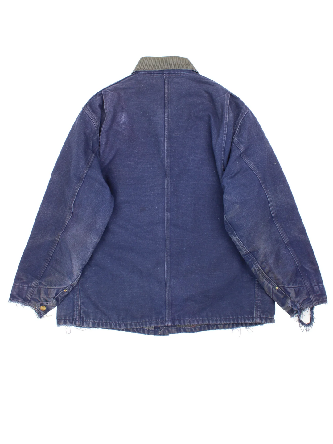Vintage Carhartt Chore Jacket in a blue colourway with a contrast corduroy collar. Buttons up and has multiple pockets, insulated with a blanket lining, and has the logos embroidered on the front.