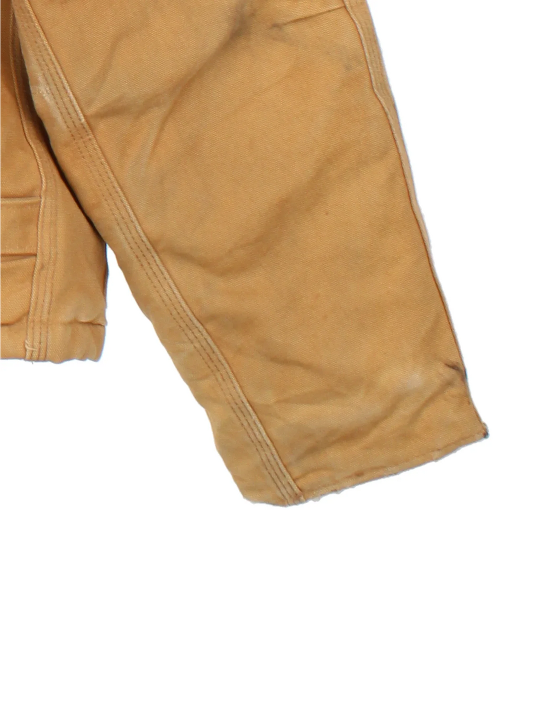 Vintage Carhartt Arctic Jacket in a tan colourway. Zip up closure and has side pockets, insulated with a quilted lining, and has the logos embroidered on the front.