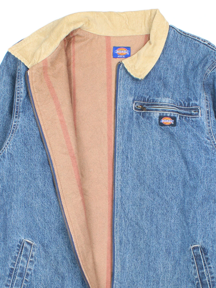 Dickies Denim Jacket in a blue colourway with cream corduroy collar. Zip up closure and has multiple pockets, insulated blanket lining, and has the logo embroidered on the front.