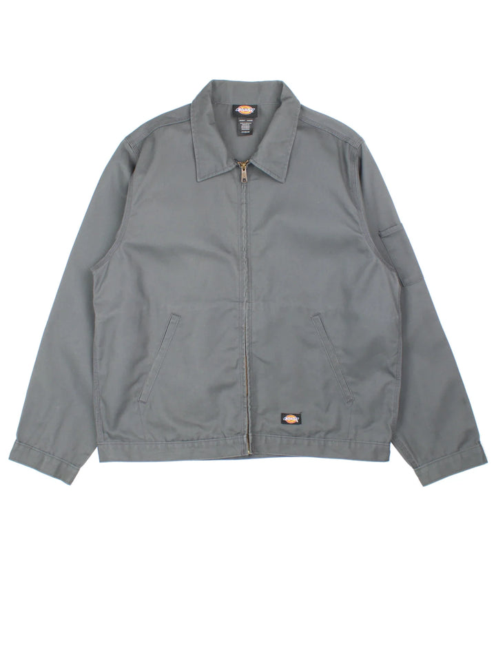 Dickies Eisenhower Work Jacket in a grey colourway. Zip up closure and has side pockets, and has the logo embroidered on the front.