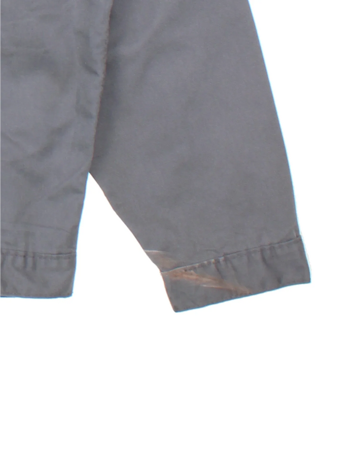 Dickies Eisenhower Work Jacket in a grey colourway. Zip up closure and has side pockets, and has the logo embroidered on the front.