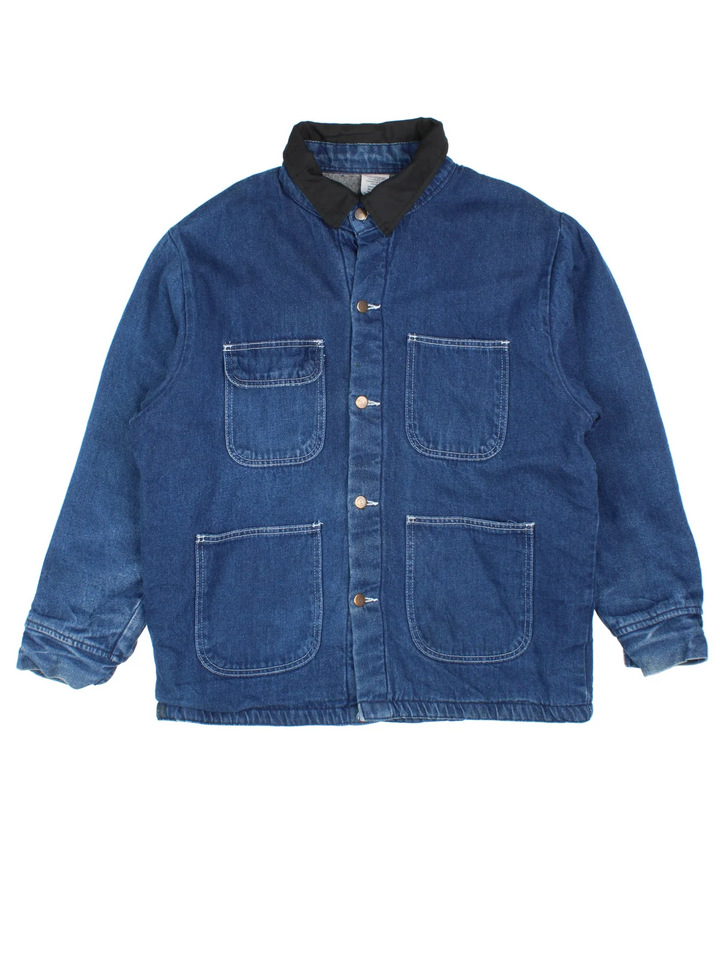 Vintage Denim Chore Jacket in a blue colourway with a black collar. Button up closure and has multiple pockets, insulated with a blanket lining.