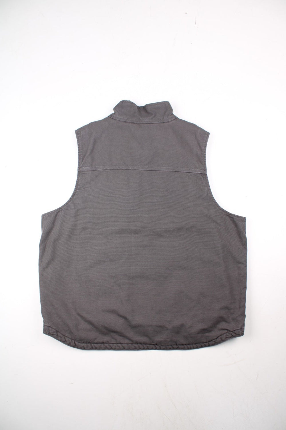 Vintage Carhartt Gilet in a grey colourway. Zip up with double pockets on front, insulated with a fleece lining and classic logo on the front.