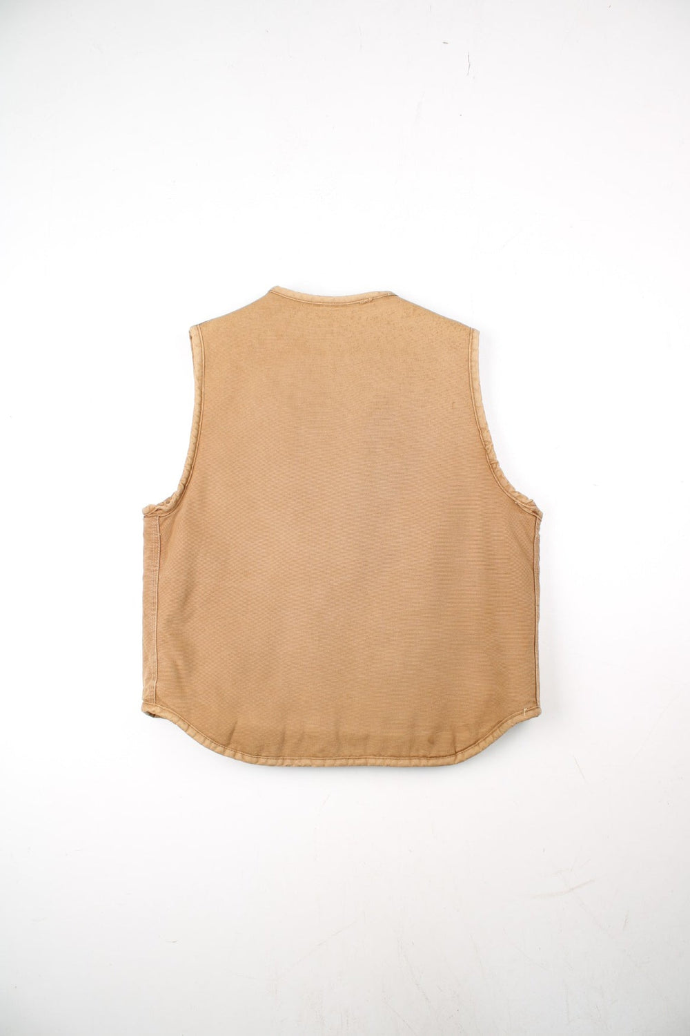 Vintage Carhartt Gilet in a tan colourway. Zip up with double pockets on front, insulated with a fleece lining.