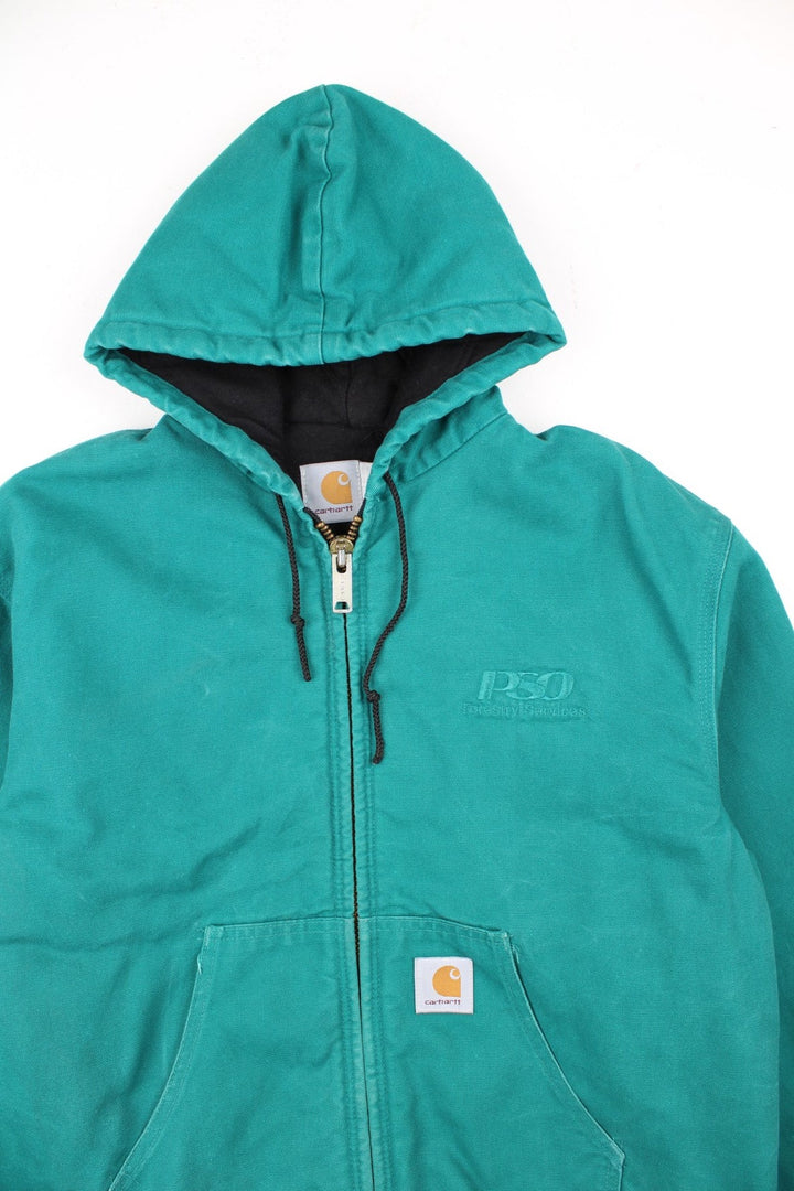 Carhartt Active Jacket in a blue colourway. Zips up and has side pockets, hooded, and has the logo embroidered on the front alongside 'PSO' company logo.