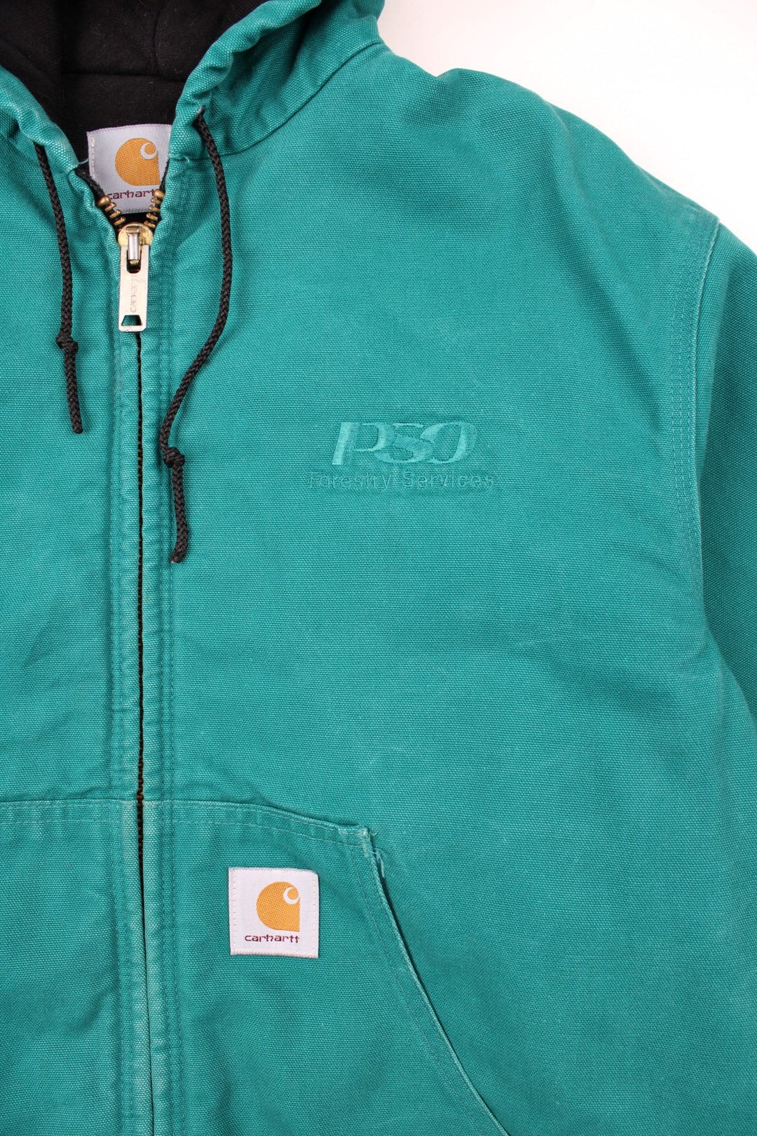 Carhartt Active Jacket in a blue colourway. Zips up and has side pockets, hooded, and has the logo embroidered on the front alongside 'PSO' company logo.
