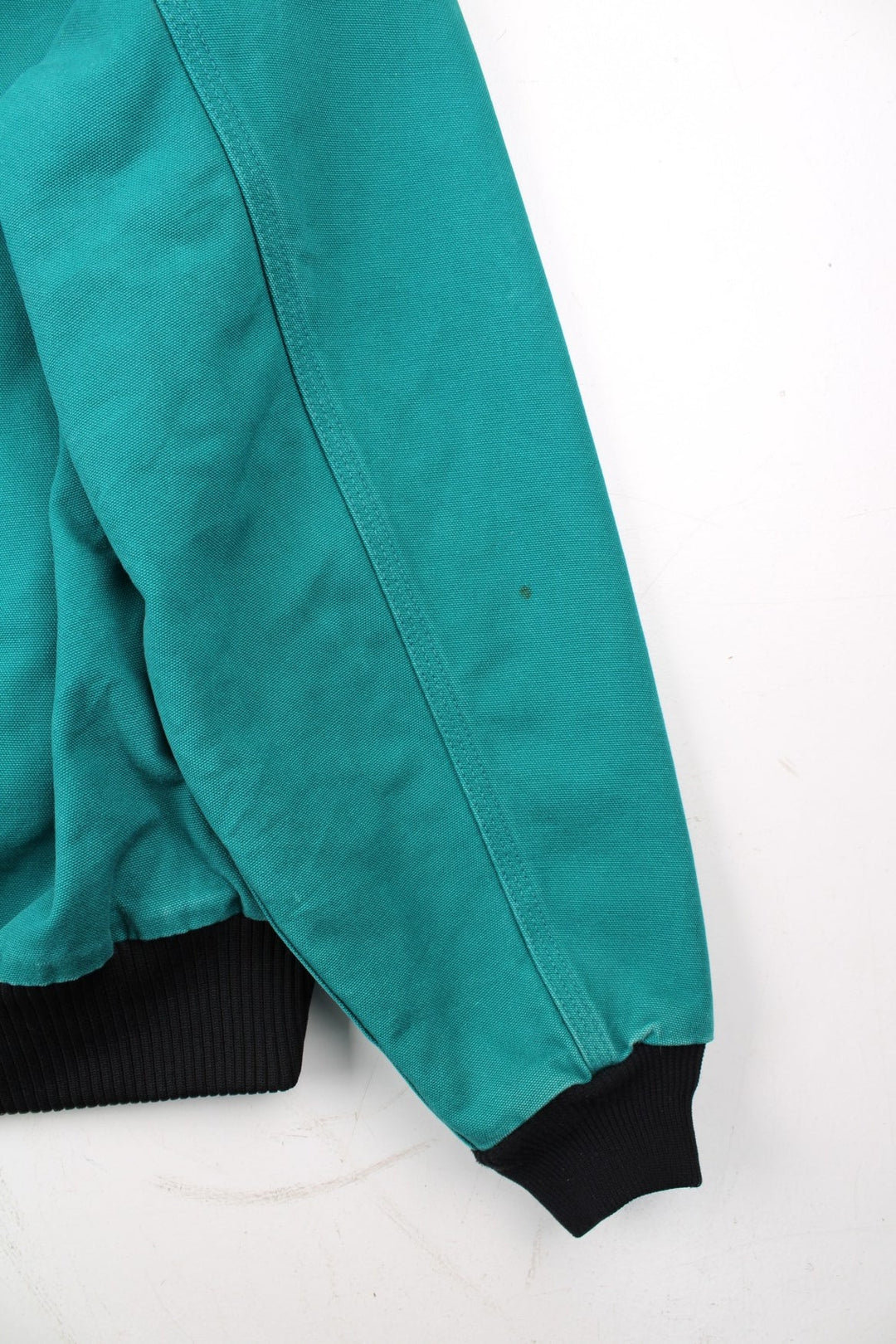 Carhartt Active Jacket in a blue colourway. Zips up and has side pockets, hooded, and has the logo embroidered on the front alongside 'PSO' company logo.