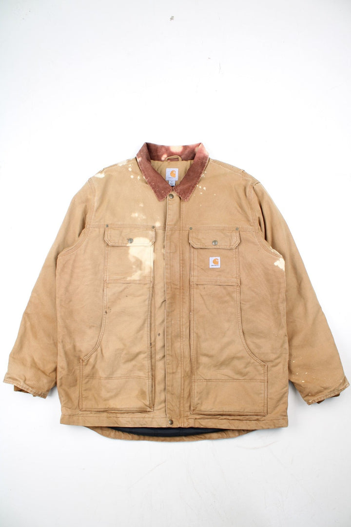 Vintage Carhartt Arctic Jacket in a tan brown colourway. Zips up and has multiple pockets, insulated with a quilted lining, and has the logo embroidered on the front.