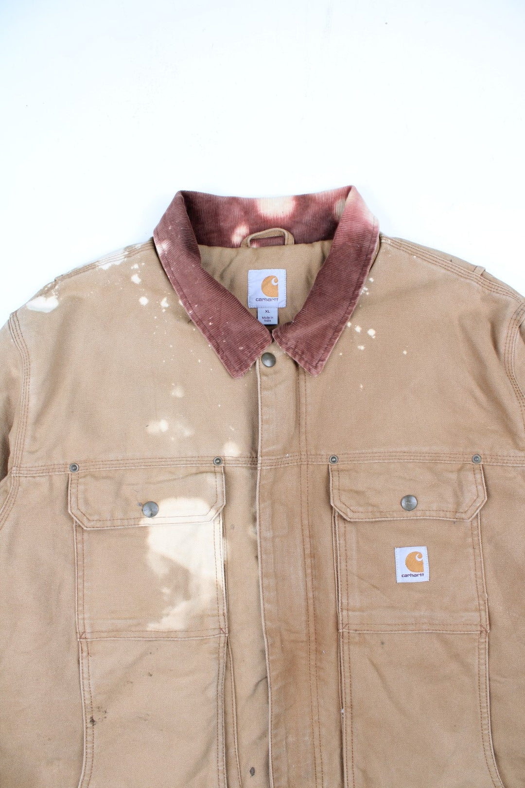 Vintage Carhartt Arctic Jacket in a tan brown colourway. Zips up and has multiple pockets, insulated with a quilted lining, and has the logo embroidered on the front.