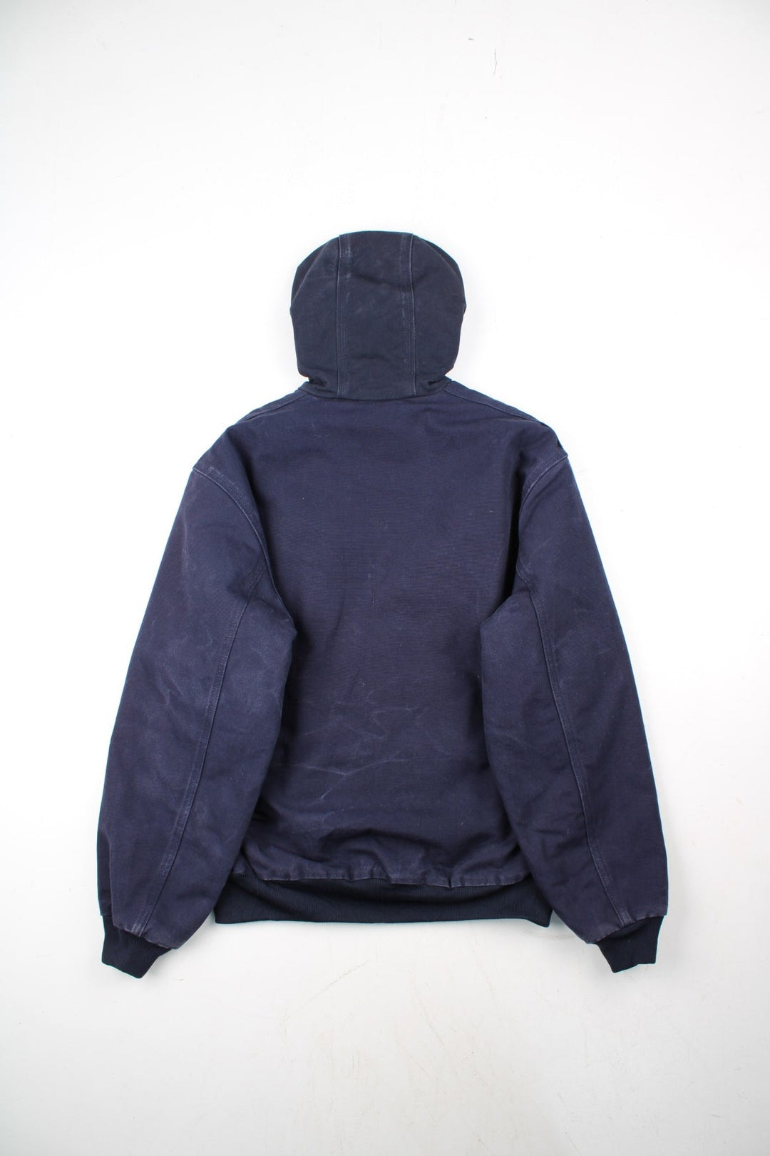 Vintage Carhartt FFA Agricultural Education Active Jacket in a blue colourway. Zips up and has side pockets, insulated with a quilted lining, and has the logo embroidered on the front alongside the FFA logo.