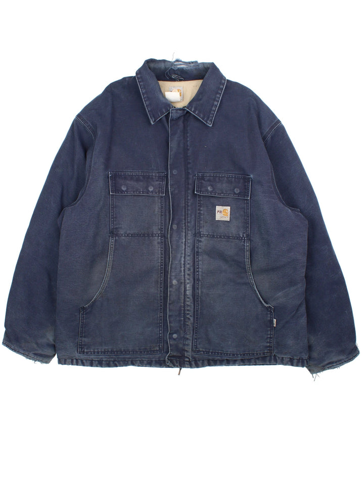 Vintage Carhartt Arctic Jacket in a blue colourway. Zips up and has multiple pockets, insulated with a quilted lining, and has the logo embroidered on the front.