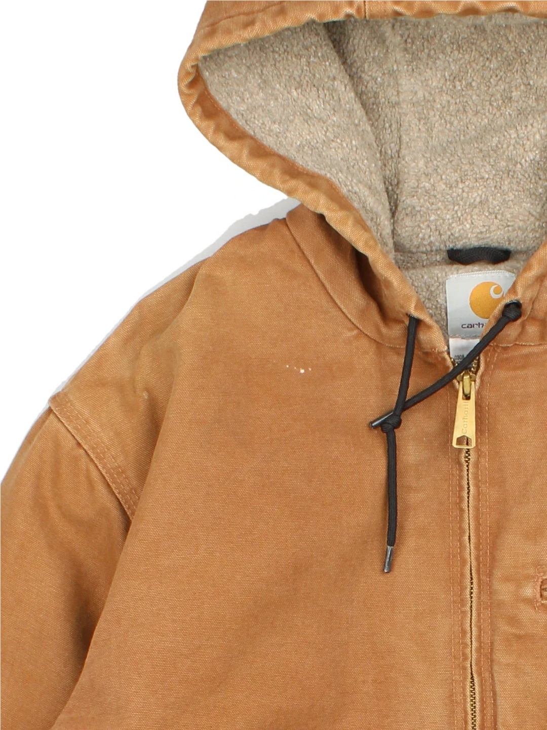 Vintage Carhartt Sierra Jacket in a tan colourway. Zips up and has multiple pockets, insulated with a sherpa lining, and has the logo embroidered on the front.