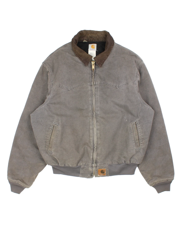 Vintage Carhartt Santa Fe Jacket in a grey colourway. Zips up and has side pockets, insulated lining, and has the logo embroidered on the front.